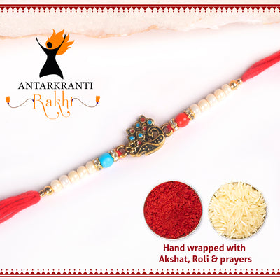 Metalic Mayur & White Pearls Rakhi with Roli Chawal & Kalawa For Men